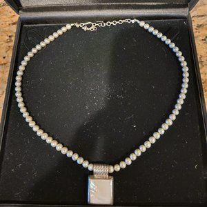 Freshwater pearl necklace with mother of pearl pendant and sterling silver
